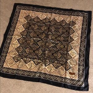 Elegant Black and Gold Patterned Scarf